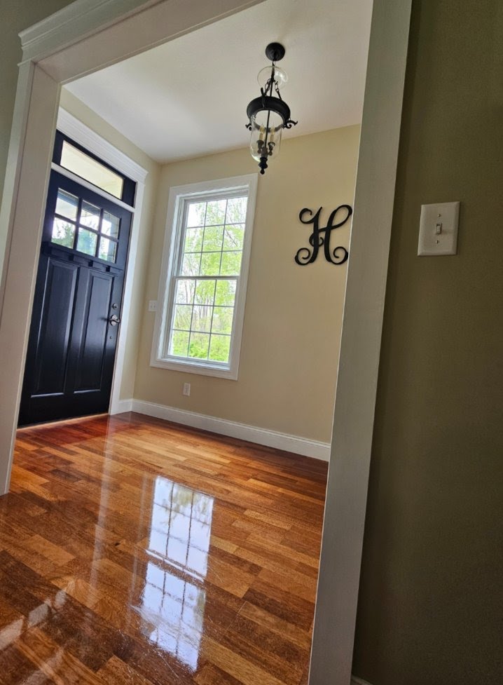 Gleaming clean entryway and hardwood floors